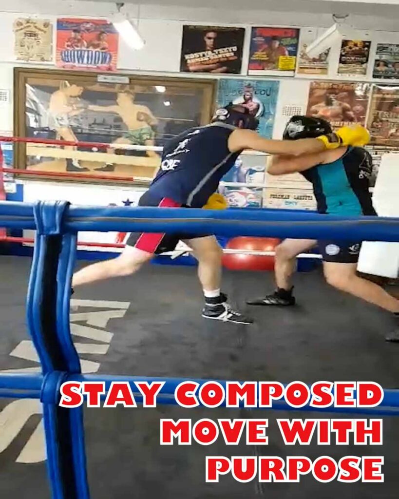 Two boxers sparring at Woolloomooloo PCYC in 2019, with the words “Stay composed. Move with purpose.”