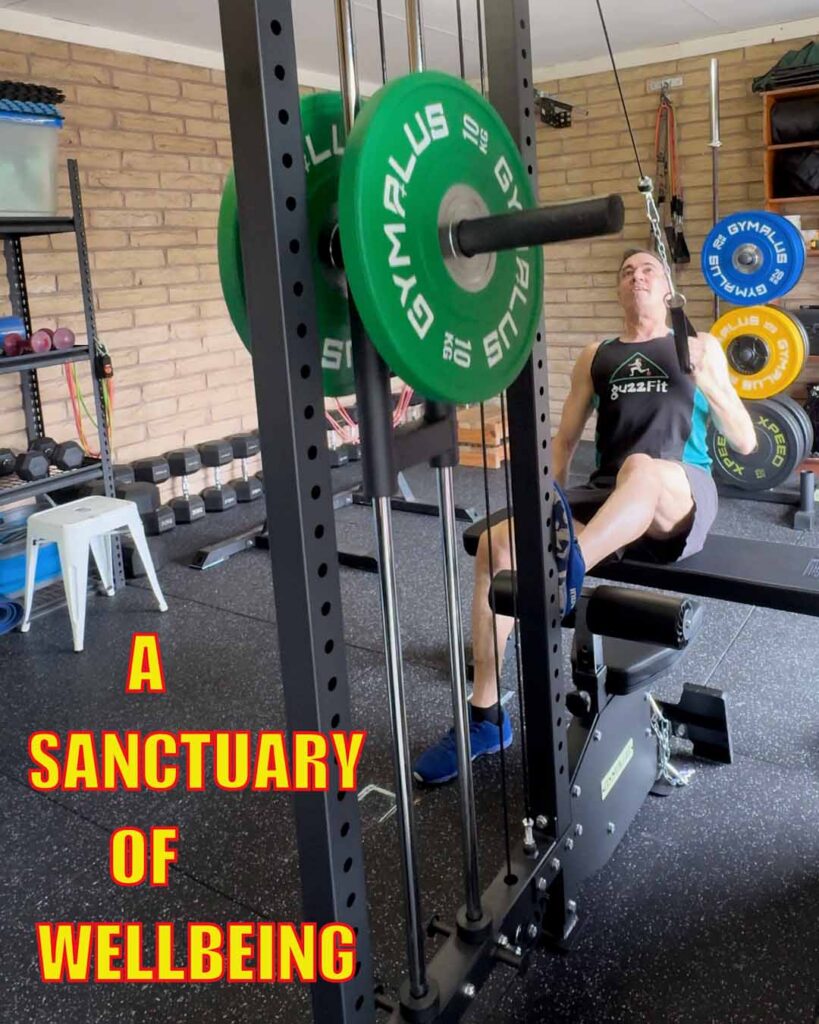 Matt demonstrating a single arm high to low cable row at the guzzFIT studio in Traralgon